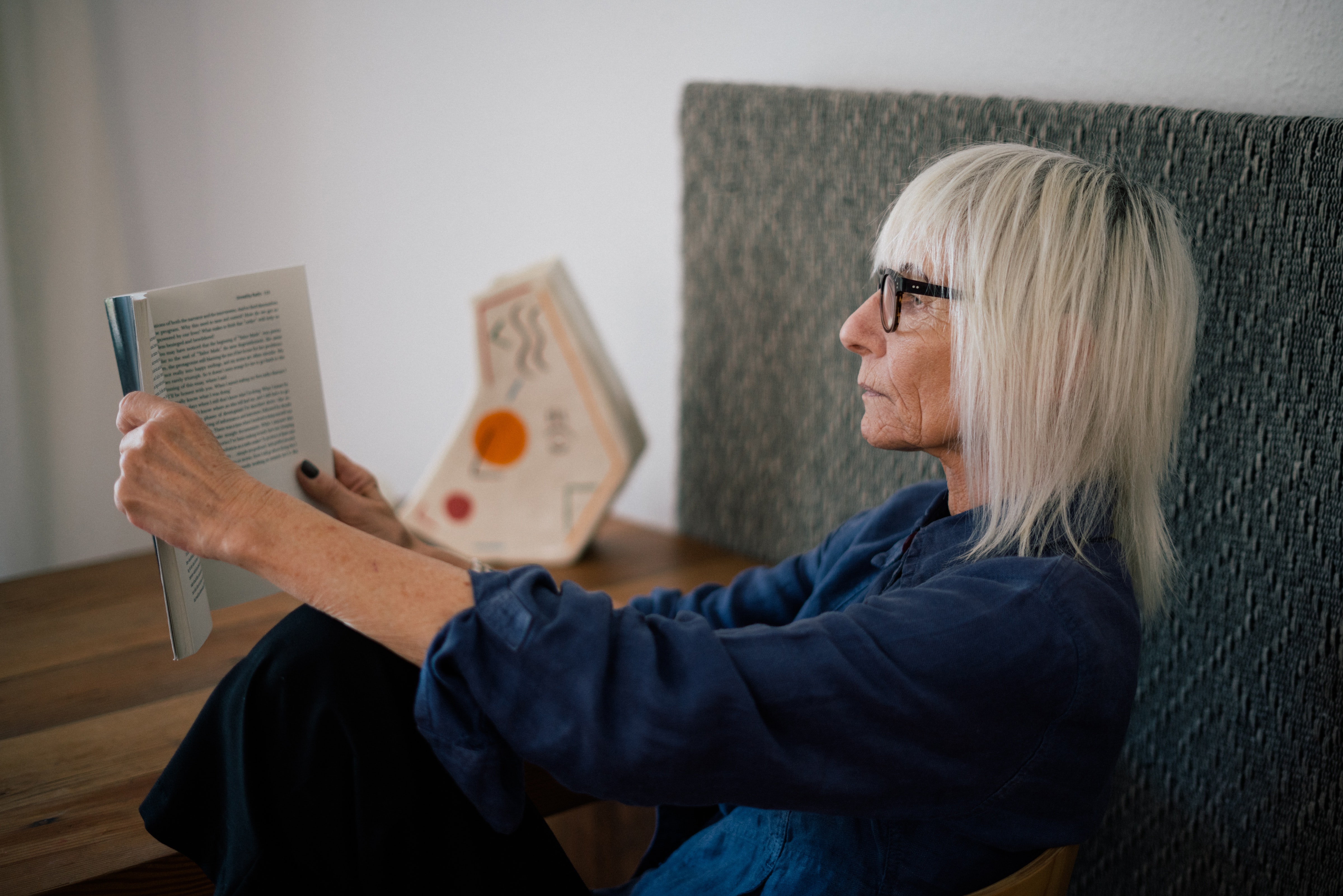 woman-in-blue-long-sleeve-shirt-wearing-black-framed-3867175