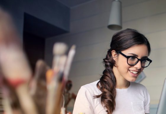 photo-of-woman-using-her-laptop-935756